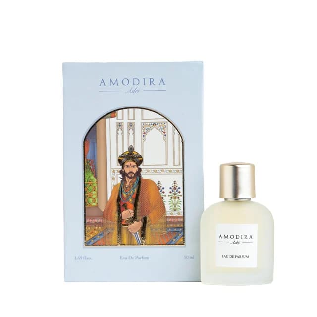 Adri perfume with its illustrated packaging.