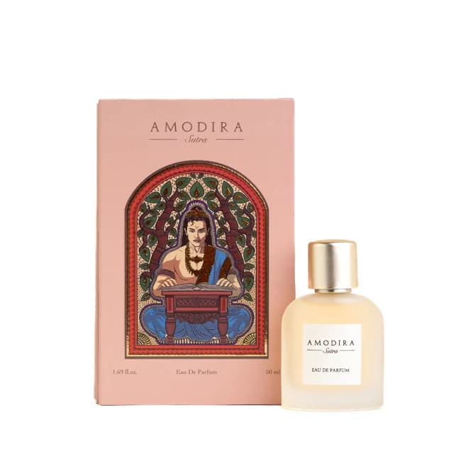 Sutra perfume with its illustrated packaging.